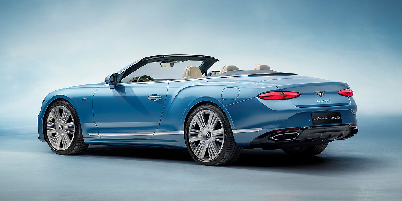 Bentley Brussels New Bentley Continental GTC Azure convertible rear view in Light Windsor blue paint with 22 inch ten spoke wheels and chrome exterior details