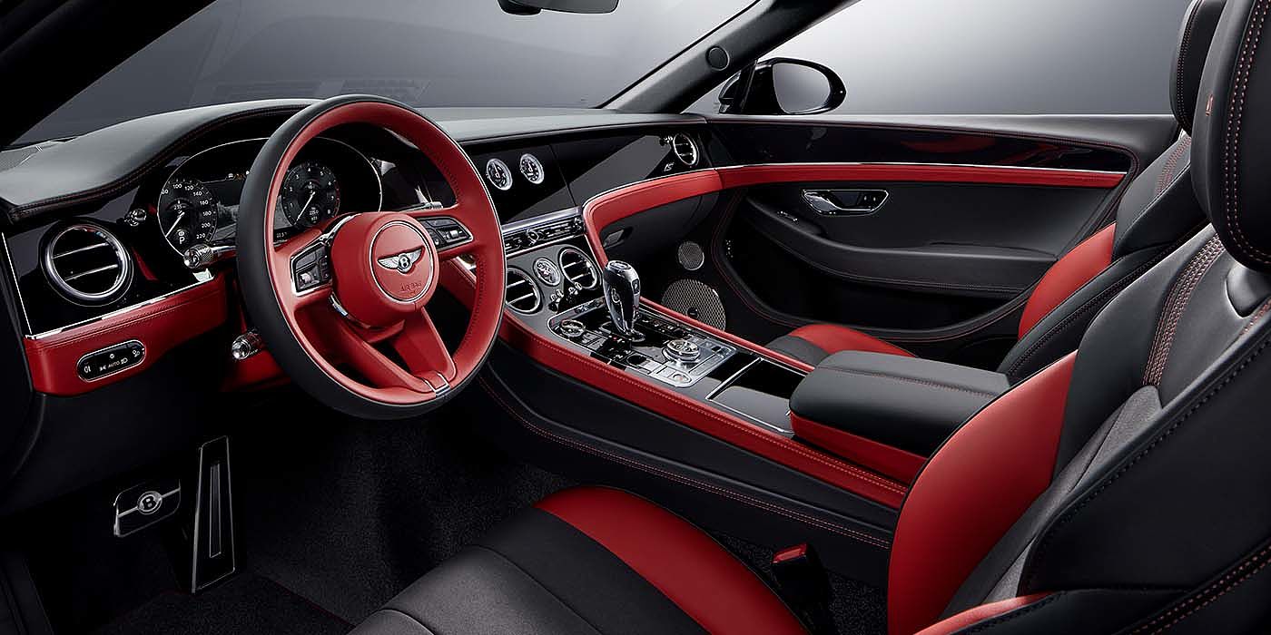 Bentley Brussels Bentley Continental GTC S convertible front interior in Beluga black and Hotspur red hide with high gloss carbon fibre veneer