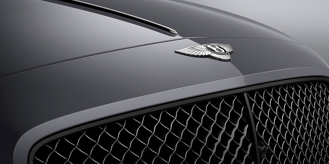 Bentley Brussels Bentley Flying Spur S Cambrian Grey colour, featuring Bentley insignia and assertive matrix front grillle