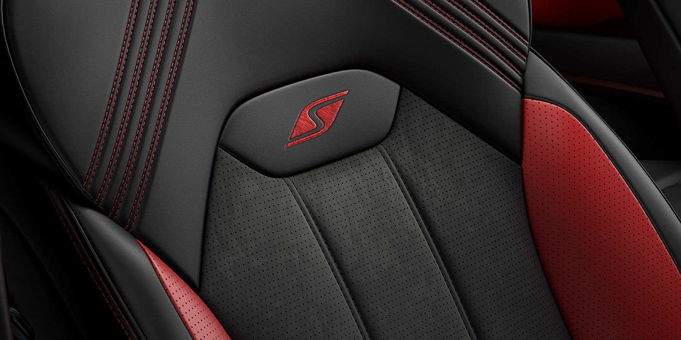 Bentley Brussels Bentley Bentayga S seat with detailed red Hotspur stitching and black Beluga coloured hide. 