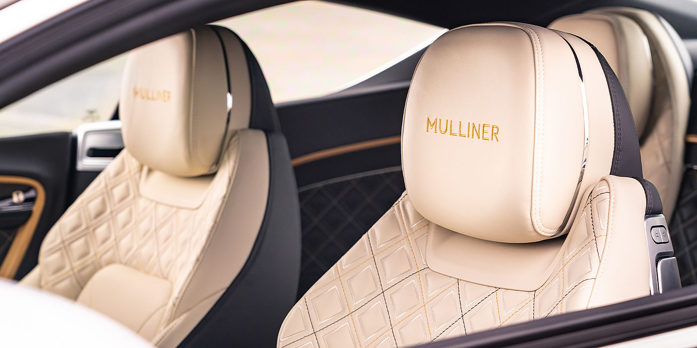 Bentley Brussels Bentley Continental GT Mulliner coupe seat detail in Beluga black and Linen hide