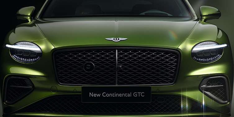 Bentley Brussels Bentley Continental GTC Speed convertible front bonnet detail in Tourmaline Green paint showing new light design