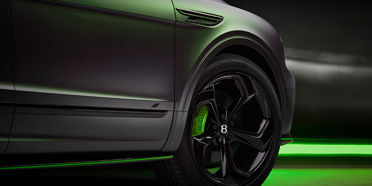 Bentley Brussels Bentley Bentayga S Black Edition SUV exterior wheel detail with Cyber Green brakes with Anthracite Satin paint